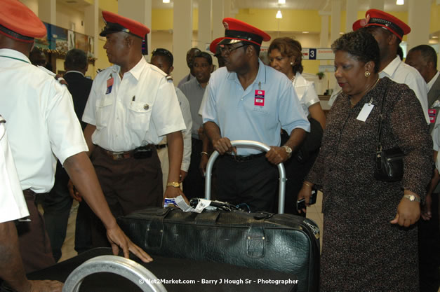 Minister of Tourism, Hon. Edmund Bartlett - Director of Tourism, Basil Smith, and Mayor of Montego Bay, Councillor Charles Sinclair Launch of Winter Tourism Season at Sangster International Airport, Saturday, December 15, 2007 - Sangster International Airport - MBJ Airports Limited, Montego Bay, Jamaica W.I. - Photographs by Net2Market.com - Barry J. Hough Sr, Photographer - Negril Travel Guide, Negril Jamaica WI - http://www.negriltravelguide.com - info@negriltravelguide.com...!