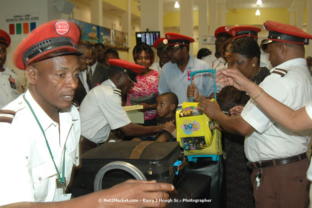 Minister of Tourism, Hon. Edmund Bartlett - Director of Tourism, Basil Smith, and Mayor of Montego Bay, Councillor Charles Sinclair Launch of Winter Tourism Season at Sangster International Airport, Saturday, December 15, 2007 - Sangster International Airport - MBJ Airports Limited, Montego Bay, Jamaica W.I. - Photographs by Net2Market.com - Barry J. Hough Sr, Photographer - Negril Travel Guide, Negril Jamaica WI - http://www.negriltravelguide.com - info@negriltravelguide.com...!