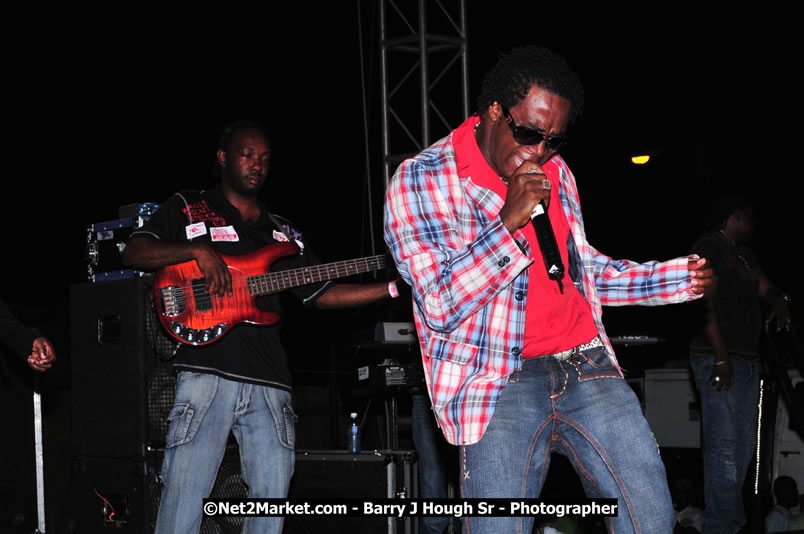 Lucea Cross the Harbour @ Lucea Car Park - All Day Event - Cross the Harbour Swim, Boat Rides, and Entertainment for the Family - Concert Featuring: Bushman, George Nooksl, Little Hero, Bushi One String, Dog Rice and many local Artists - Friday, August 1, 2008 - Lucea, Hanover Jamaica - Photographs by Net2Market.com - Barry J. Hough Sr. Photojournalist/Photograper - Photographs taken with a Nikon D300 - Negril Travel Guide, Negril Jamaica WI - http://www.negriltravelguide.com - info@negriltravelguide.com...!