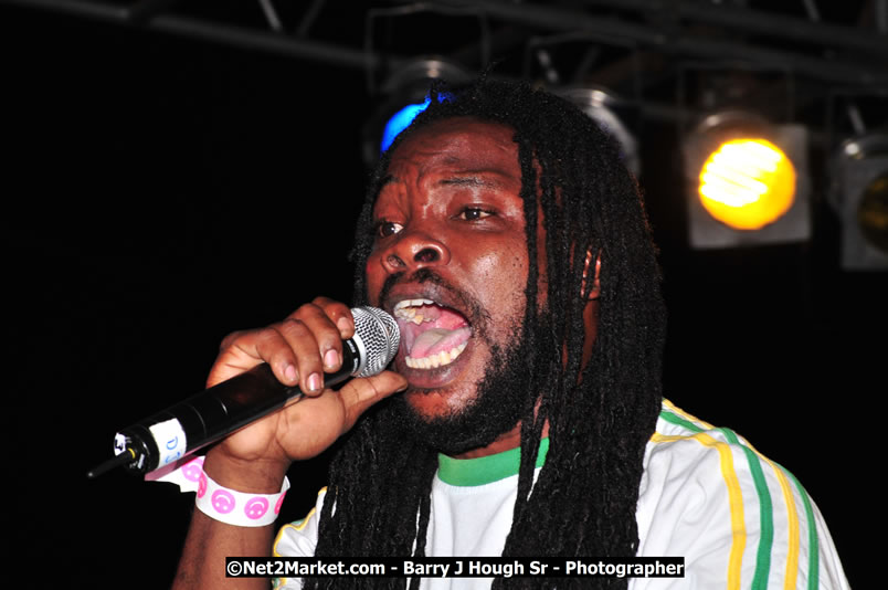 Lucea Cross the Harbour @ Lucea Car Park - All Day Event - Cross the Harbour Swim, Boat Rides, and Entertainment for the Family - Concert Featuring: Bushman, George Nooksl, Little Hero, Bushi One String, Dog Rice and many local Artists - Friday, August 1, 2008 - Lucea, Hanover Jamaica - Photographs by Net2Market.com - Barry J. Hough Sr. Photojournalist/Photograper - Photographs taken with a Nikon D300 - Negril Travel Guide, Negril Jamaica WI - http://www.negriltravelguide.com - info@negriltravelguide.com...!