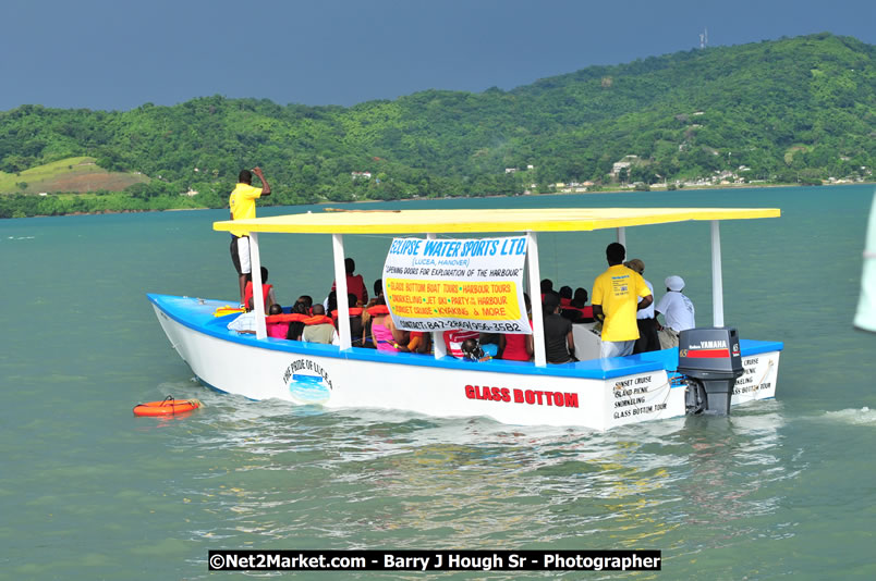 Lucea Cross the Harbour @ Lucea Car Park - All Day Event - Cross the Harbour Swim, Boat Rides, and Entertainment for the Family - Concert Featuring: Bushman, George Nooksl, Little Hero, Bushi One String, Dog Rice and many local Artists - Friday, August 1, 2008 - Lucea, Hanover Jamaica - Photographs by Net2Market.com - Barry J. Hough Sr. Photojournalist/Photograper - Photographs taken with a Nikon D300 - Negril Travel Guide, Negril Jamaica WI - http://www.negriltravelguide.com - info@negriltravelguide.com...!