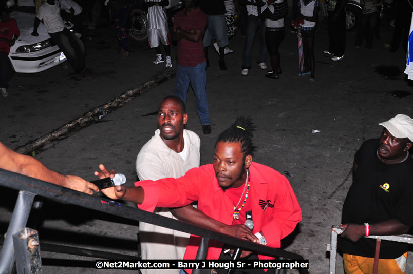 Lucea Cross the Harbour @ Lucea Car Park - All Day Event - Cross the Harbour Swim, Boat Rides, and Entertainment for the Family - Concert Featuring: Bushman, George Nooksl, Little Hero, Bushi One String, Dog Rice and many local Artists - Friday, August 1, 2008 - Lucea, Hanover Jamaica - Photographs by Net2Market.com - Barry J. Hough Sr. Photojournalist/Photograper - Photographs taken with a Nikon D300 - Negril Travel Guide, Negril Jamaica WI - http://www.negriltravelguide.com - info@negriltravelguide.com...!