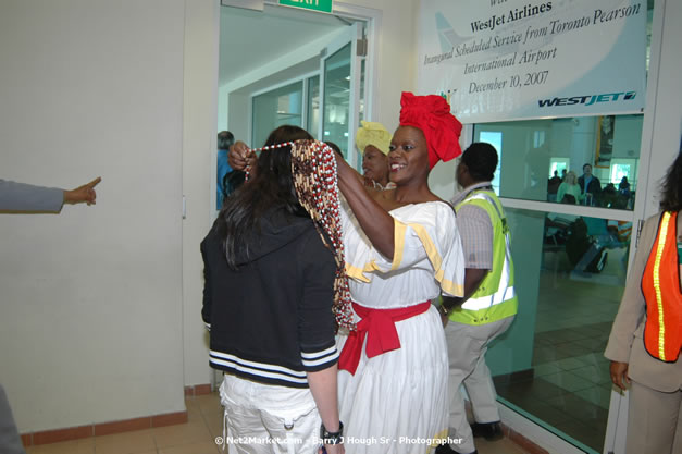 MBJ Airports Limited Welcomes WestJet Airlines - Inaugural Scheduled Service From Toronto Pearsons International Airport - Monday, December 10, 2007 - Sangster International Airport - MBJ Airports Limited, Montego Bay, Jamaica W.I. - Photographs by Net2Market.com - Barry J. Hough Sr, Photographer - Negril Travel Guide, Negril Jamaica WI - http://www.negriltravelguide.com - info@negriltravelguide.com...!