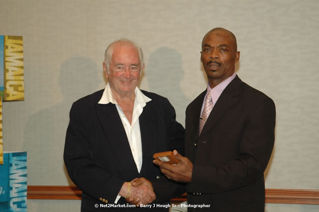 Red Cap Porters Awards - Minister of Tourism, Hon. Edmund Bartlett - Director of Tourism, Basil Smith - Friday, December 14, 2007 - Holiday Inn Sunspree, Montego Bay, Jamaica W.I. - Photographs by Net2Market.com - Barry J. Hough Sr, Photographer - Negril Travel Guide, Negril Jamaica WI - http://www.negriltravelguide.com - info@negriltravelguide.com...!