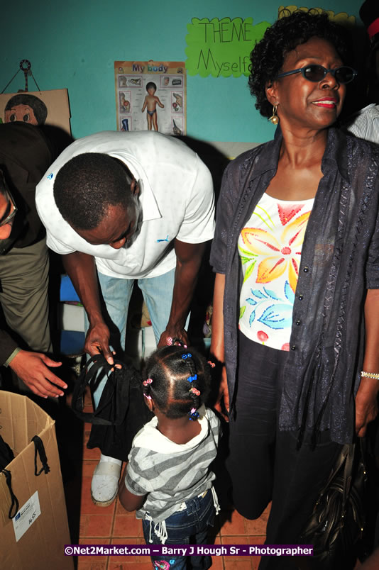 Usain Bolt of Jamaica - The Fastest Man In The World  - Usain Bolt Homecoming Celebrations - Press Conference at the Grand Bahia Principe &amp; Sherwood Content - Waldensia Primary School - Photographs by Net2Market.com - Barry J. Hough Sr. Photojournalist/Photograper - Photographs taken with a Nikon D300 - Negril Travel Guide, Negril Jamaica WI - http://www.negriltravelguide.com - info@negriltravelguide.com...!